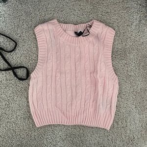 Pink sweater vest